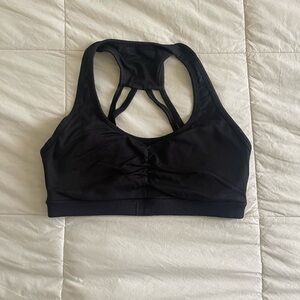 Women's Black Sports Bra with Ruched Detail and Open Back